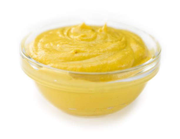 istock Portion of Mustard isolated on white 810529096