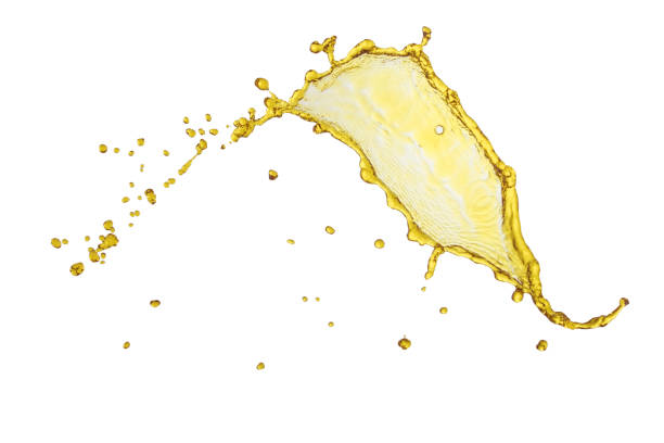 istock flying beautiful engine oil isolated over white background and many drops 810532738