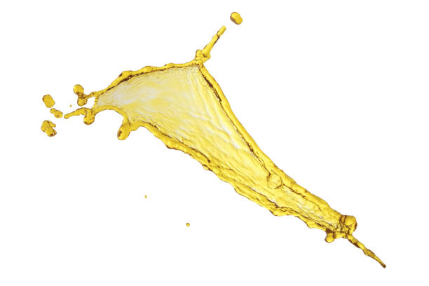 istock flying beautiful engine oil isolated over white background and many drops 810533440