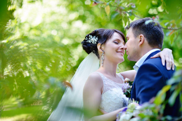 istock Wedding couple on the nature is hugging each other 810536722