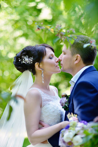 istock Wedding couple on the nature is hugging each other 810536796