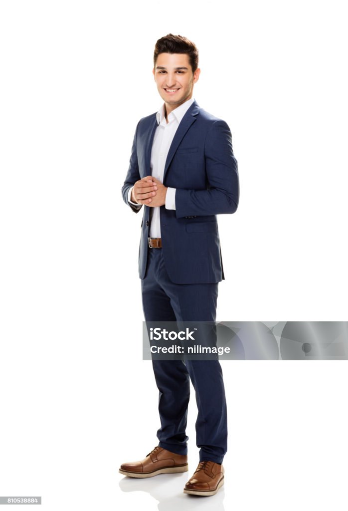 Handsome young man posing on white background. Suit Stock Photo