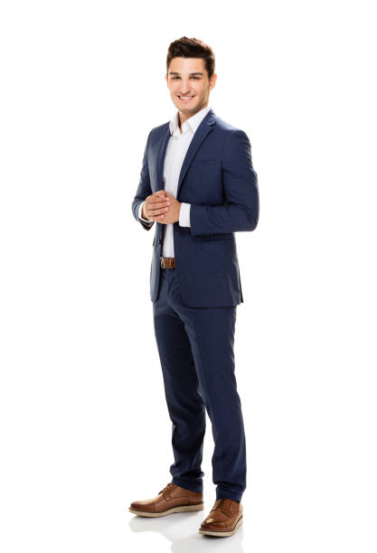 handsome young man posing on white background. - mans suit imagens e fotografias de stock