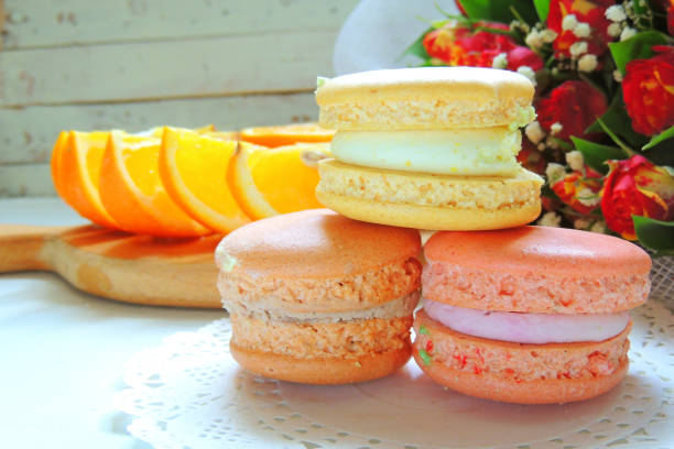 istock Macaroons and flowers roses 810542980