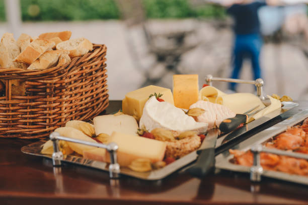 istock cheese plate with strawberry and bread basket 810555694