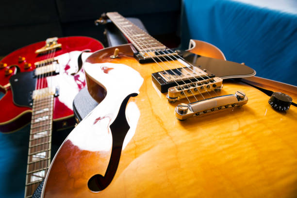 istock Acoustic guitars and cases 810559412