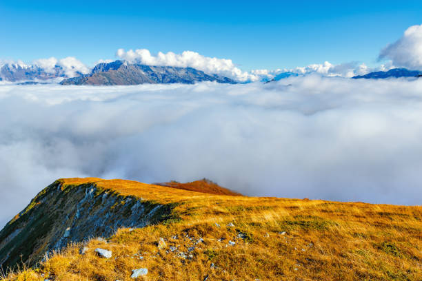 istock Clouds cover the mountain tops. 810561252