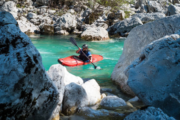 istock Mature Man Kayaking In White Water Of River Soca 810563610