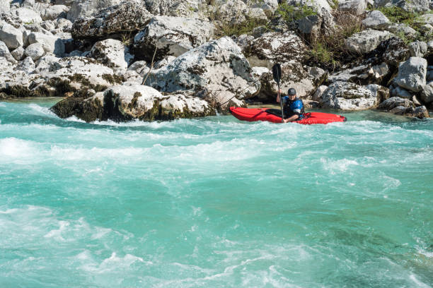 istock Mature Man Kayaking In White Water Of River Soca 810563644