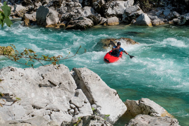 istock Kayaker Exploring The White Water's Of River Soca 810563778