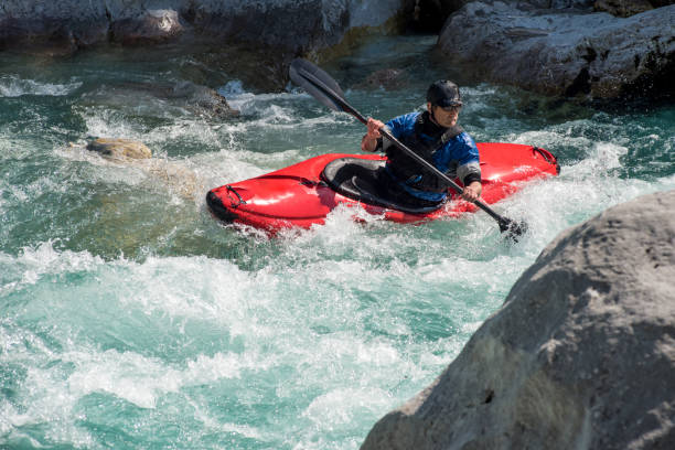 istock Kayaker Exploring The White Water's Of River Soca 810563852