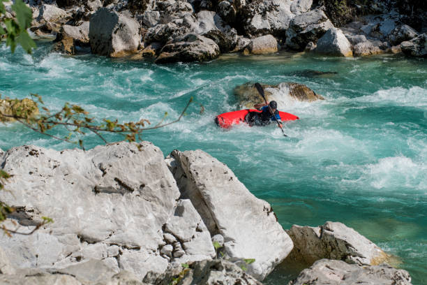 istock Kayaker Exploring The White Water's Of River Soca 810563984