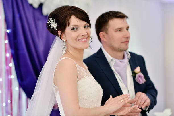 istock Wedding couple indoors is hugging each other 810564612