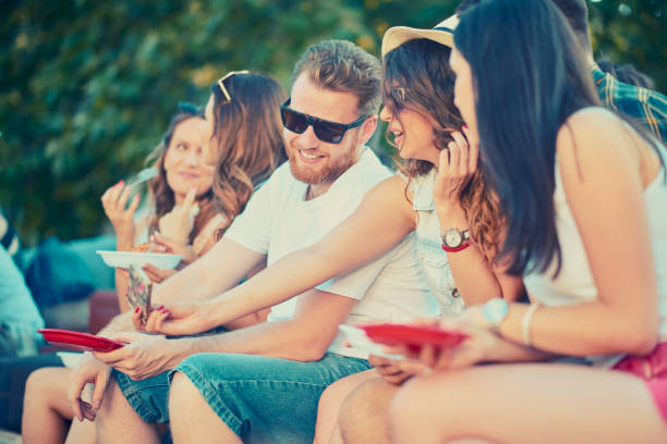 istock Couple taking self portrait at outdoor party 810568746