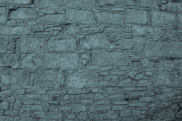 istock Twilight. Chipped stone wall texture and background. Ancient building. High resolution 810571406