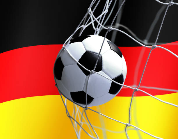 istock soccer ball on German flag background 810576362