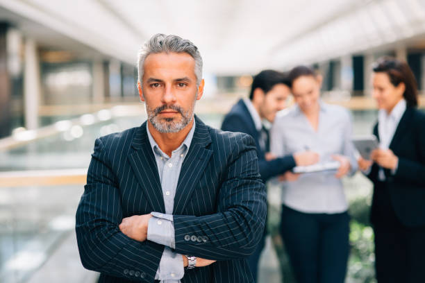 istock Businesman at a meeting 810578740