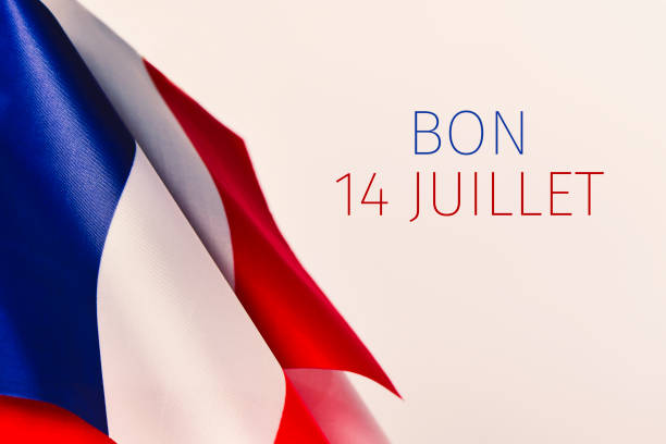 text bon 14 juillet, happy 14 july in French some french flags and the text text bon 14 juillet, happy 14 july, the national day of France written in French, against an off-white background bastille day photos stock pictures, royalty-free photos & images