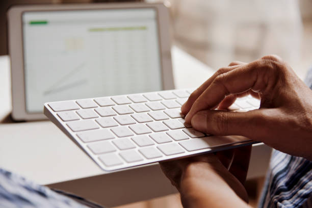 istock young man in pajamas typing in a keyboard 810579070