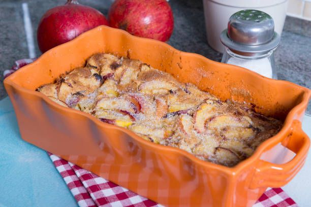 istock Clafoutis with peaches in an orange dish 810579528