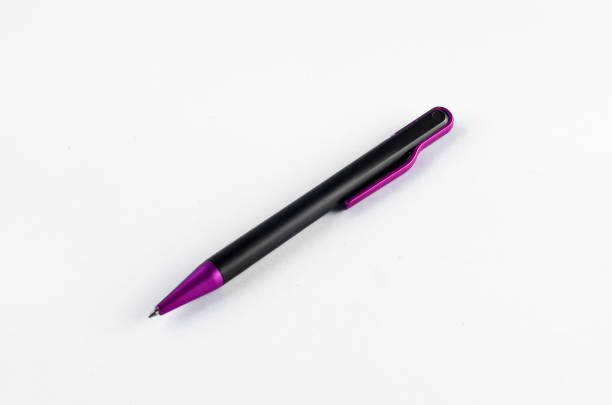 istock Purple and black pen on white background 810593856