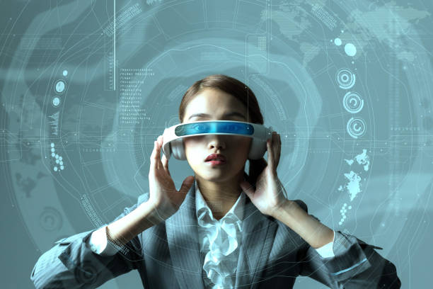 istock young woman wearing head mount display and futuristic GUI, smart glasses, graphical user interface, heads up display, Internet of Things 810598556