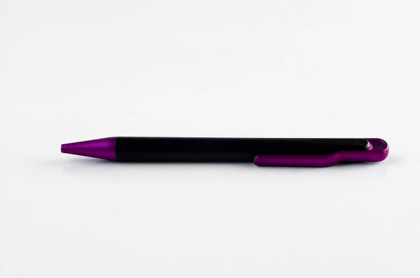 istock Purple and black pen on white background 810598804