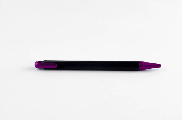 istock Purple and black pen on white background 810600134