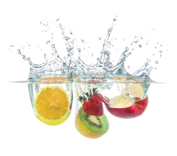istock orange strawberry kiwi apple drop with water splash 810600352