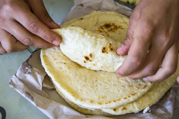 istock To make hamburger among turkish bread, to make cheese hamburger with fresh doner bread 810602960