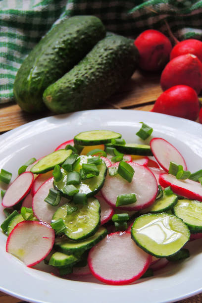 istock Spring salad with radishes and cucumber 810606700