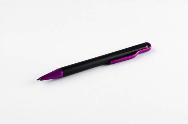 istock Purple and black pen on white background 810613084