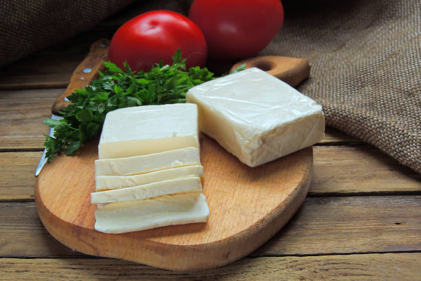 istock Cottage cheese, greens and tomato 810629636