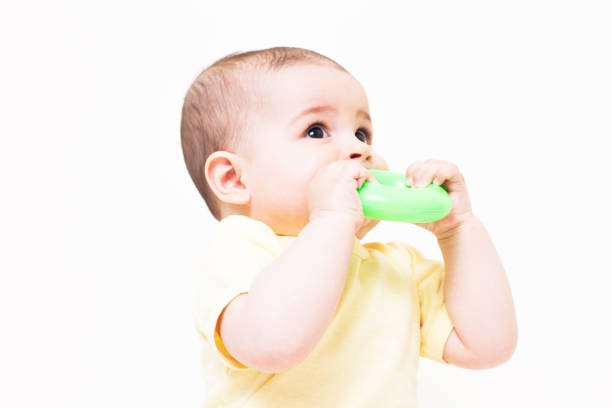 istock Beautiful baby playing with educational colorful toy 810634578