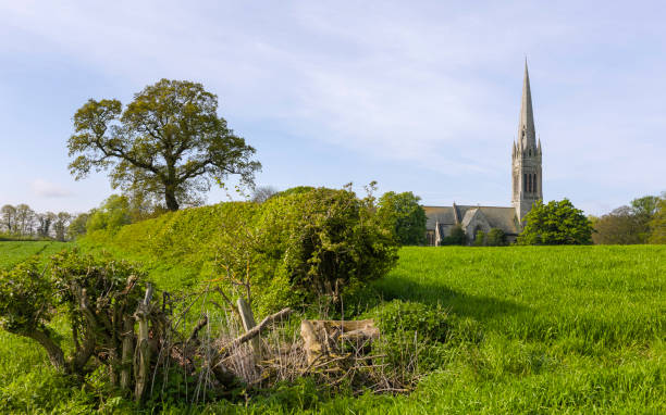 St Marys Church surrounded by wheat field, Yorkshire, UK.