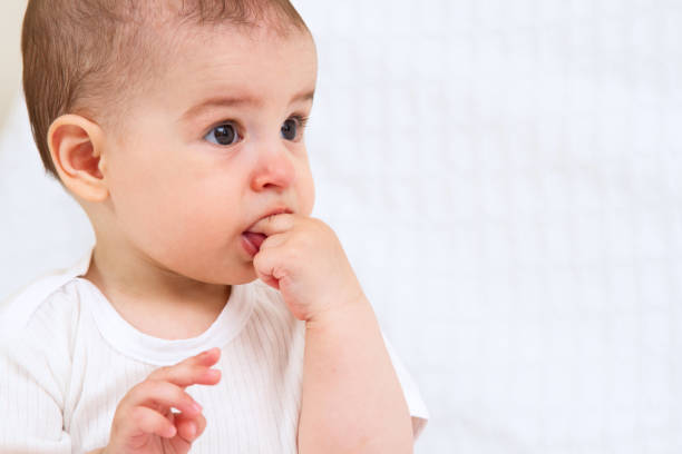 istock Beautiful baby portrait on white background 810657128