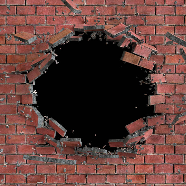 istock 3d render, 3d illustration, explosion, cracked red brick wall, bullet hole, destruction, abstract background 810657504