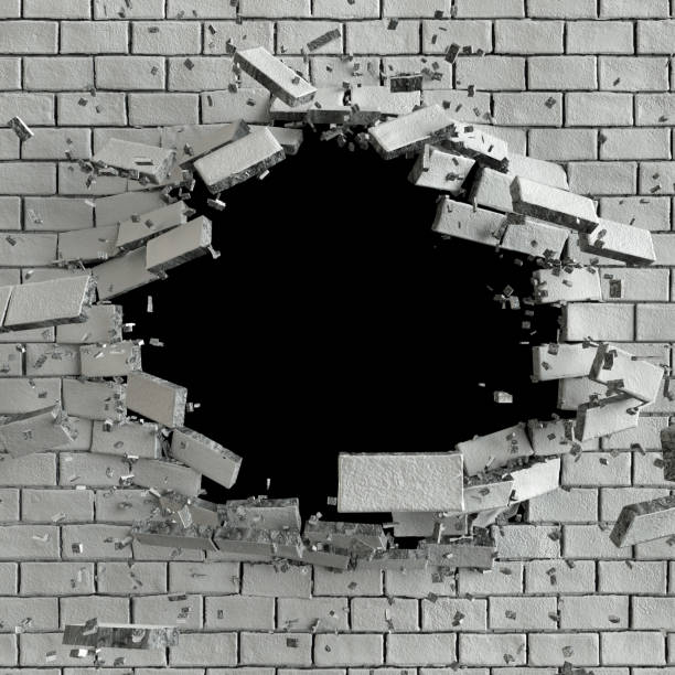 istock 3d render, 3d illustration, explosion, cracked brick wall, bullet hole, destruction, abstract background 810657652