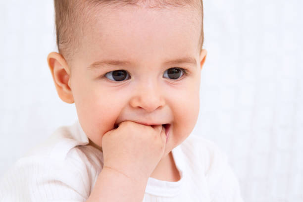 istock Beautiful baby on white background 810667368