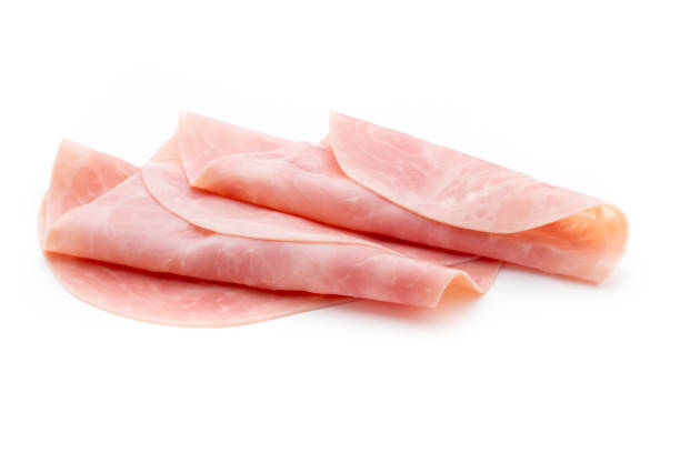 istock Thin slices of ham on white background. 810670388
