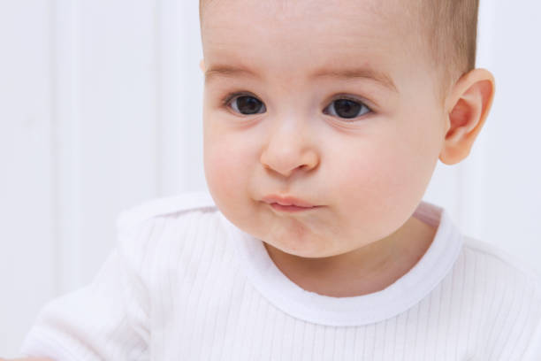 istock Beautiful baby portrait on white background 810689434