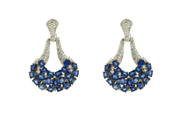 istock Earrings isolated on a white background. 810692596