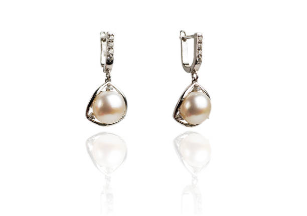 istock Earrings isolated on a white background. 810692660