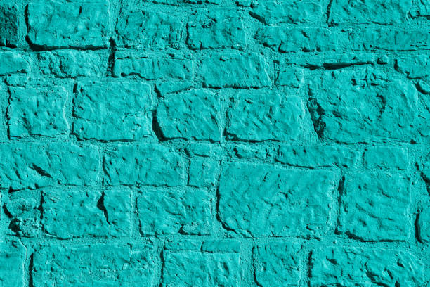 istock Old stone wall in aqua color 810705332