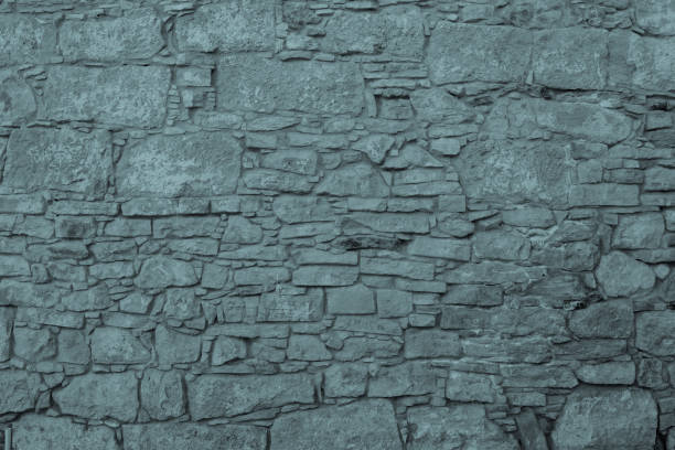 istock Twilight. Chipped stone wall texture and background. Ancient building. High resolution 810710936