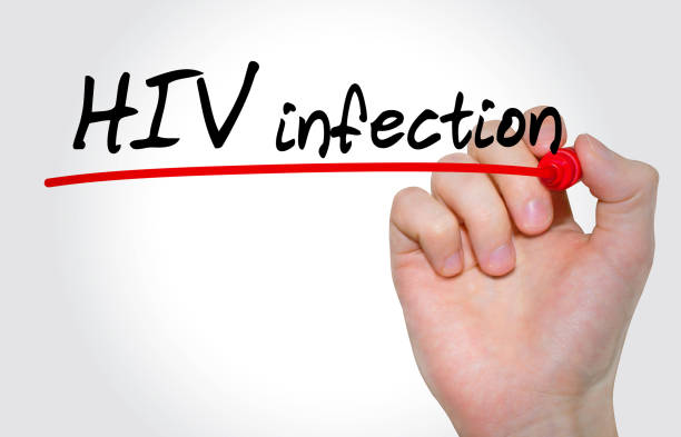 istock Hand writing inscription HIV infection with marker, concept 810718614