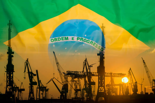 Industrial concept with Brazil flag at sunset