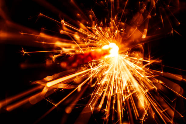 istock Beautiful red sparkler candle. Abstract close-up look. 810736770