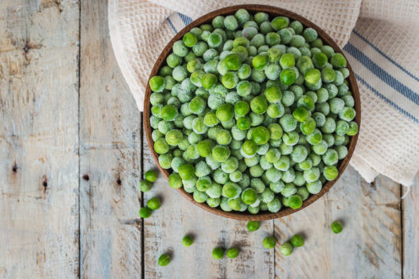istock Fresh frozen peas. 810781650