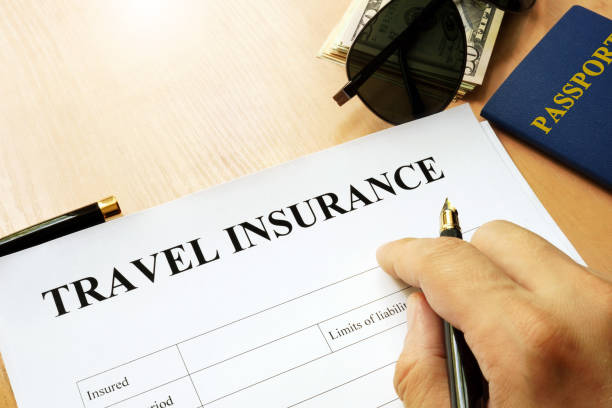 istock Travel insurance form on a table. 810795108